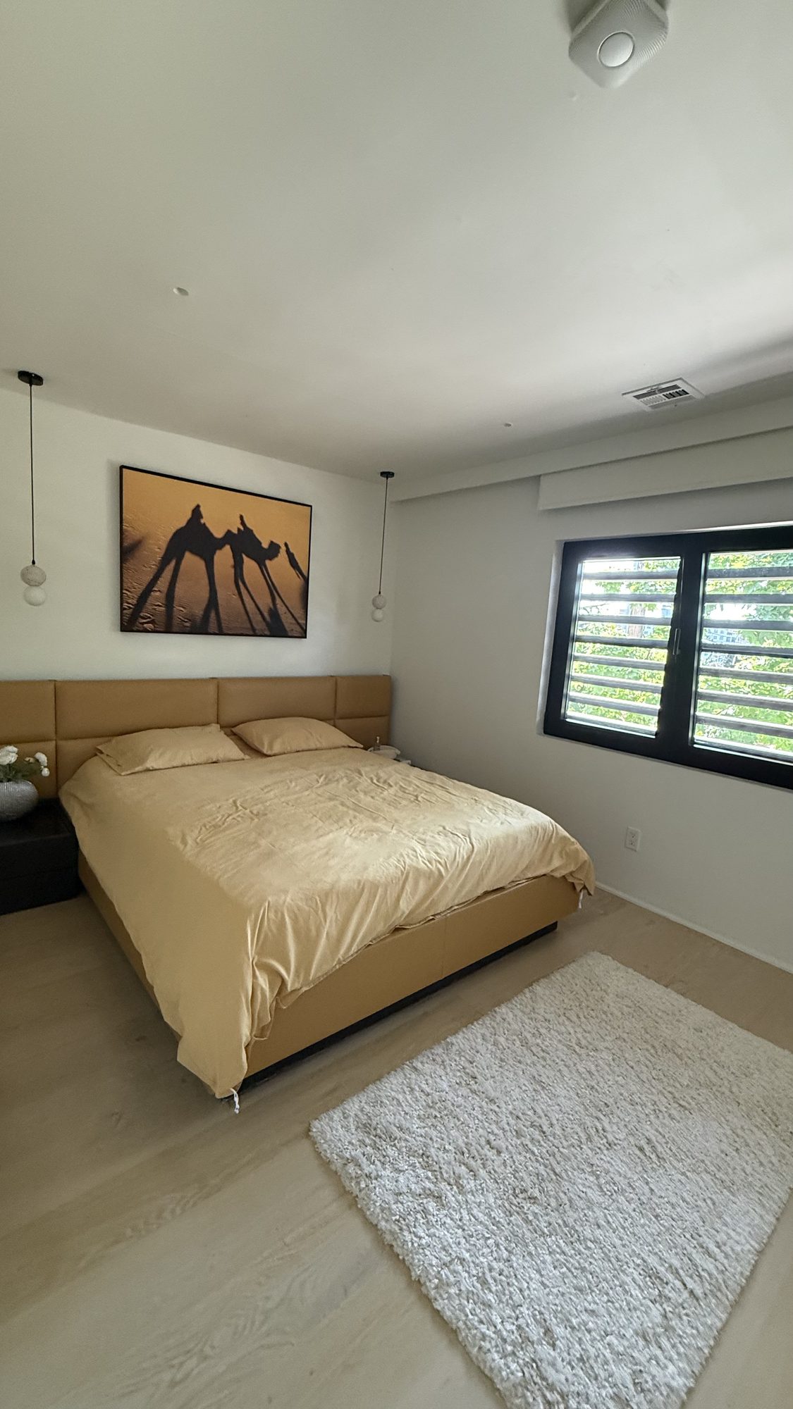 Bedroom with gold furnishings