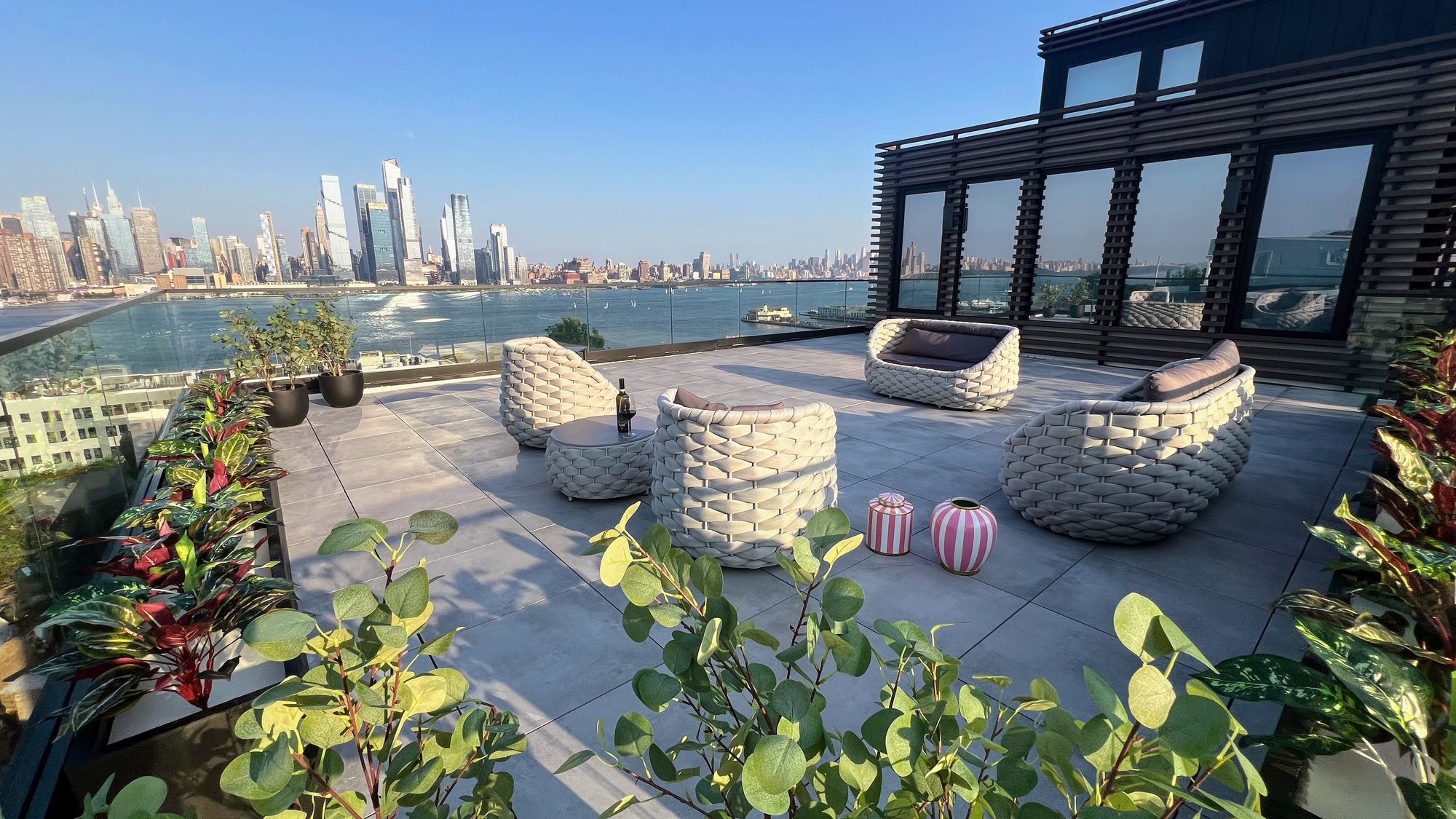 Rooftop terrace lounge with skyline